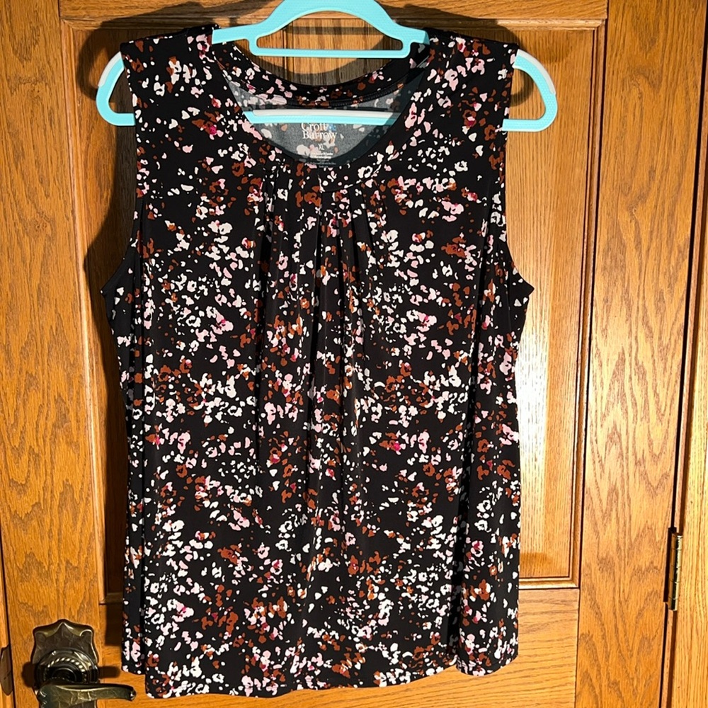 Unusual neckline with over & under pleats 
Easy care knit